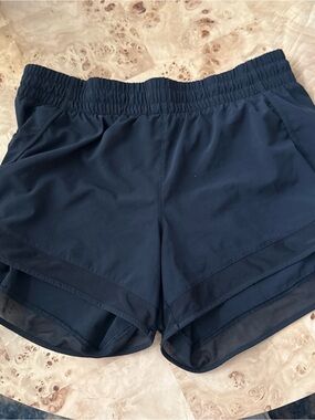 Athleta black workout shorts; Size Medium